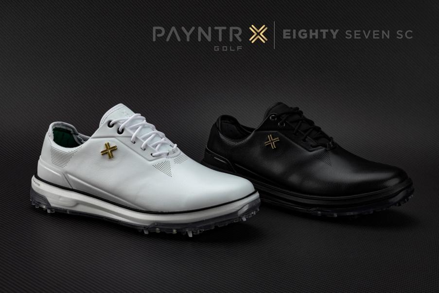 A pair of golf shoes

Description automatically generated