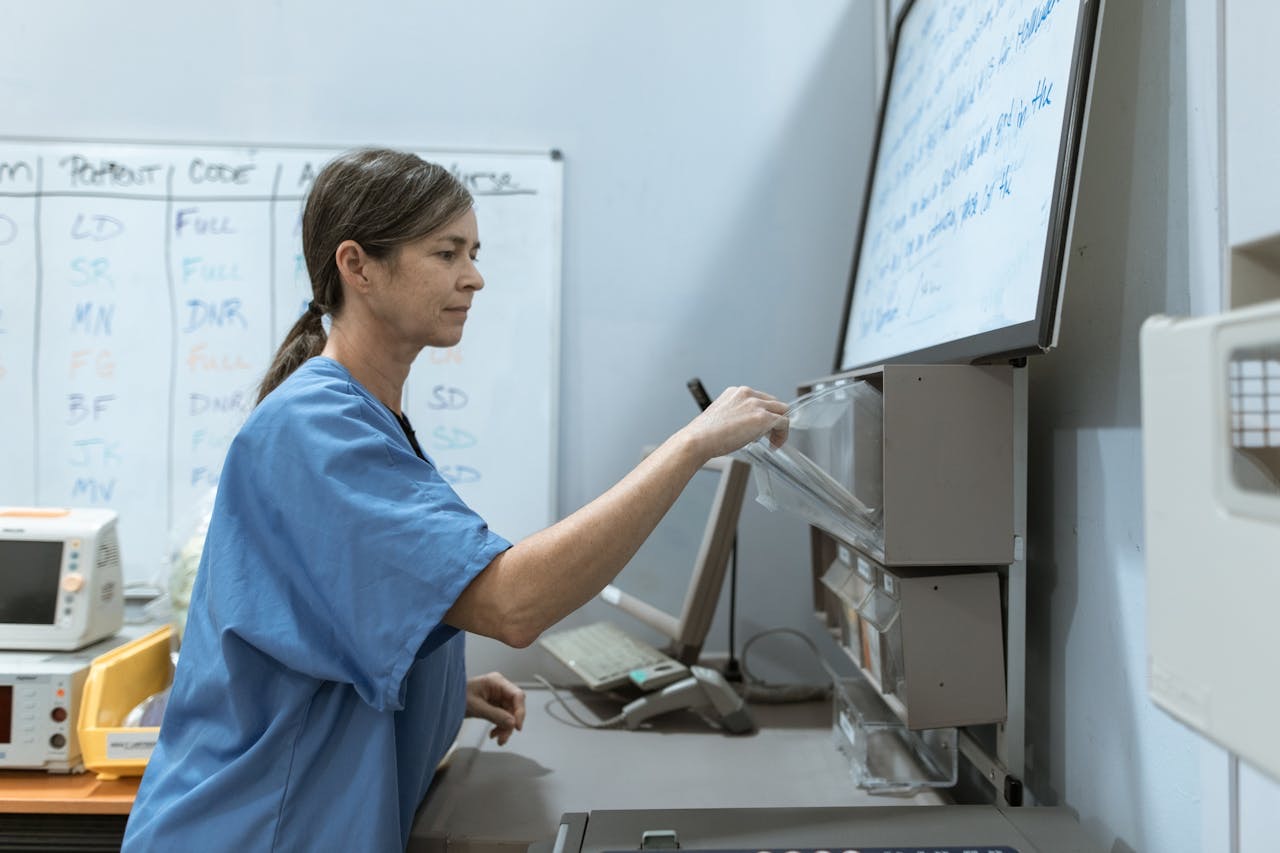 Female doctor working on machine // Healthier Baby Today