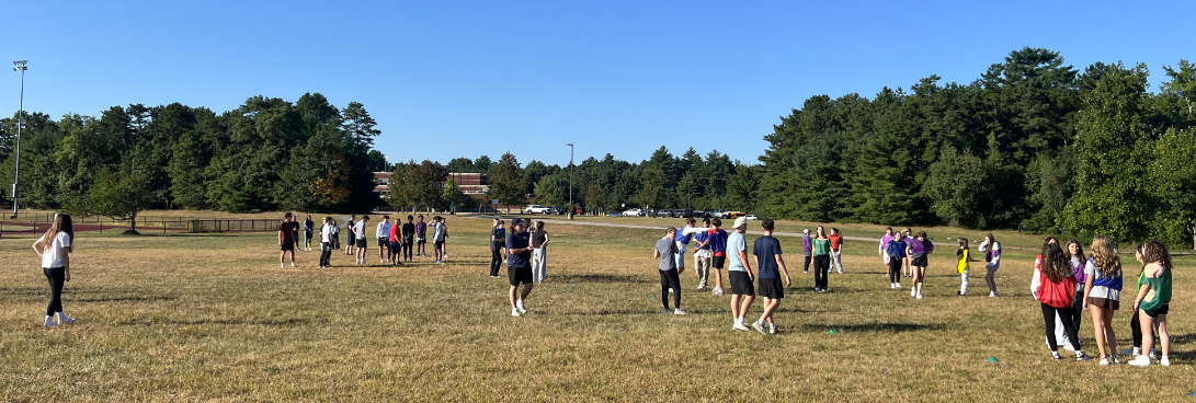 image of students playing flag football