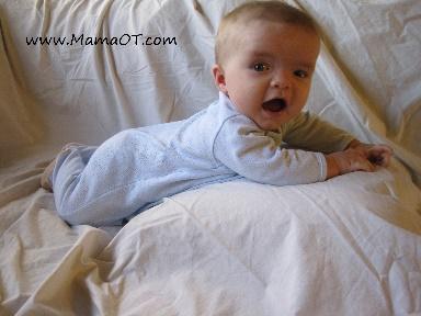 http://mamaot.com/wp-content/uploads/2012/03/tummy-on-pillow.jpg