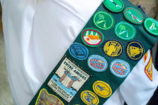 sewn on patches on sash