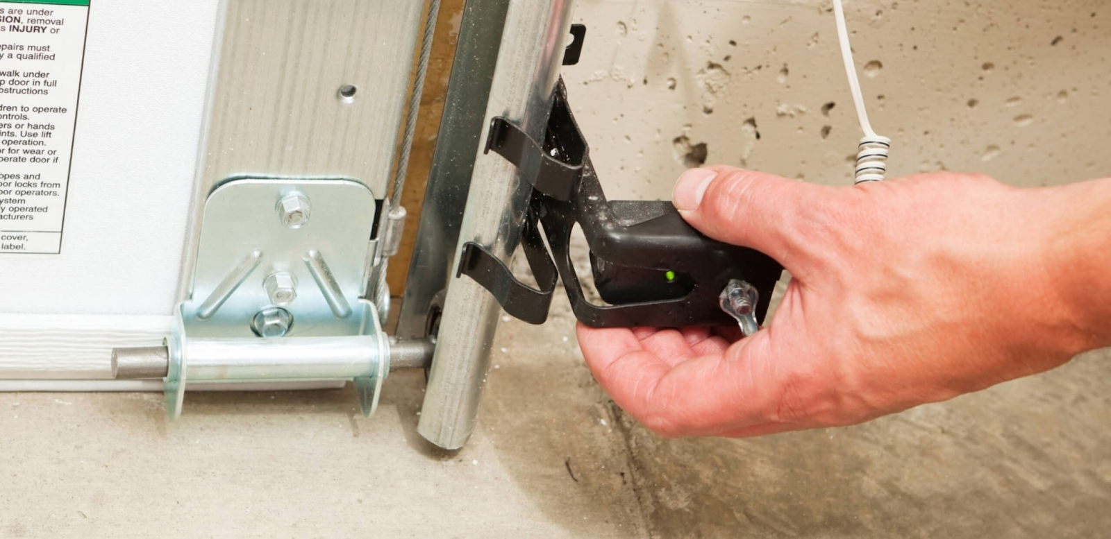 how to reset garage door sensors