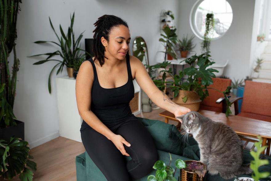 A woman petting her cat