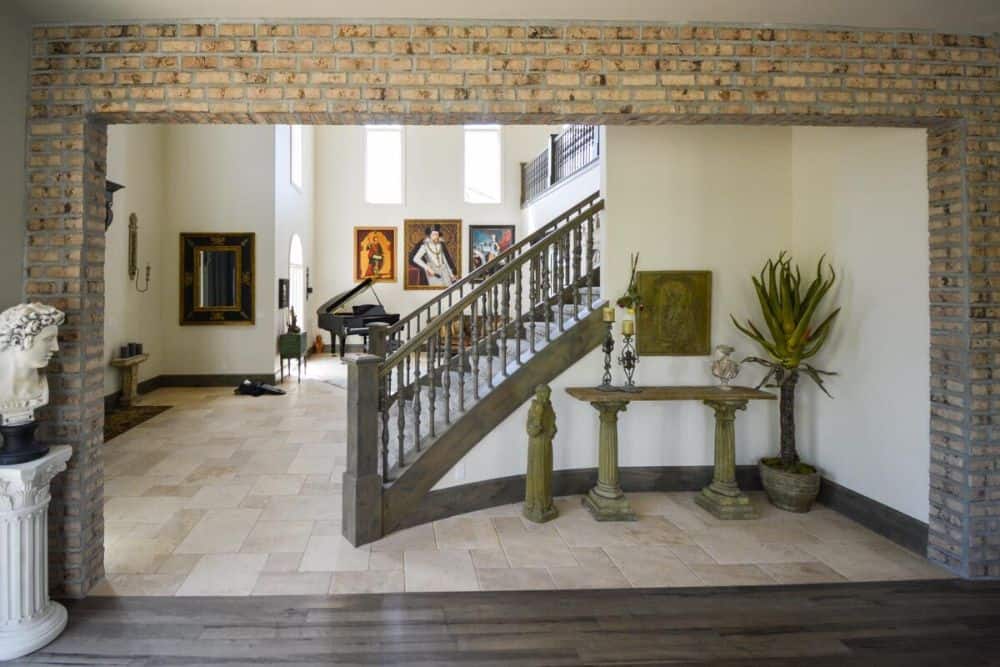 Classic red bricks frame the open living space.