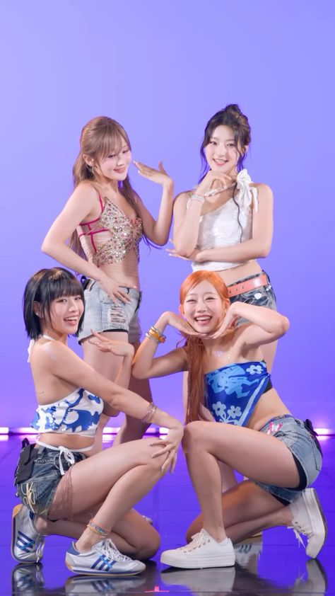 This contains an image of  KISS OF LIFE's group members posing together in their bathing suits