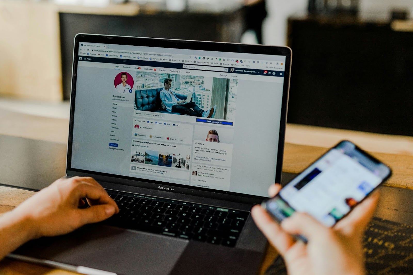 Person using Facebook on a laptop with a professional profile visible