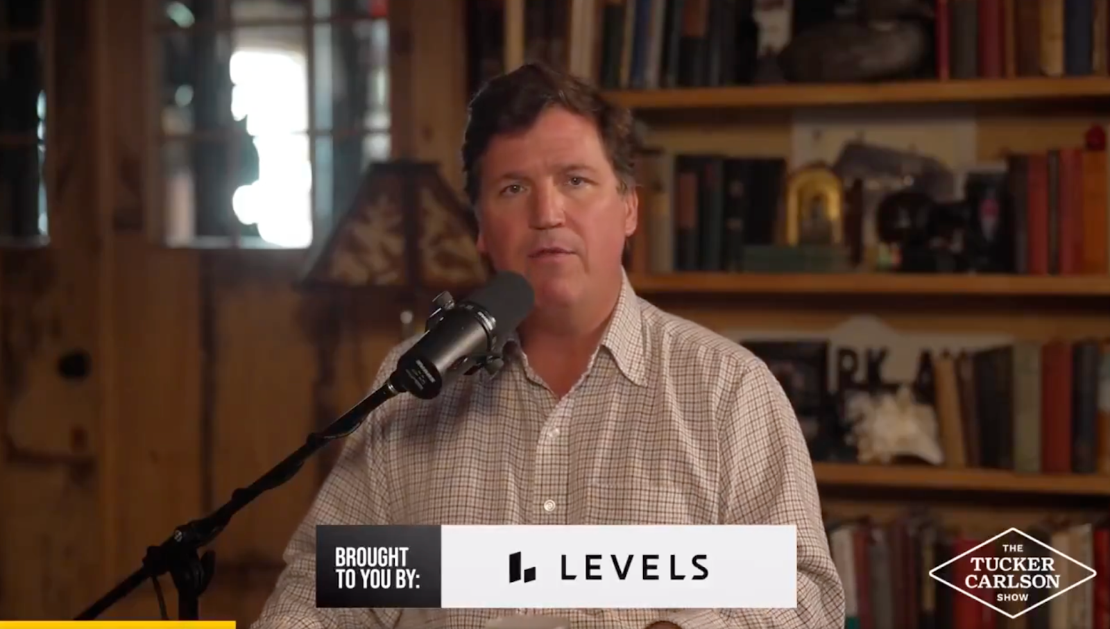 Screenshot from The Tucker Carlson Show, June 2025 broadcast with RFK Jr.: “Brought to you by: LEVELS