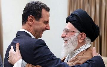 A person in a suit and turban hugging another person

AI-generated content may be incorrect.