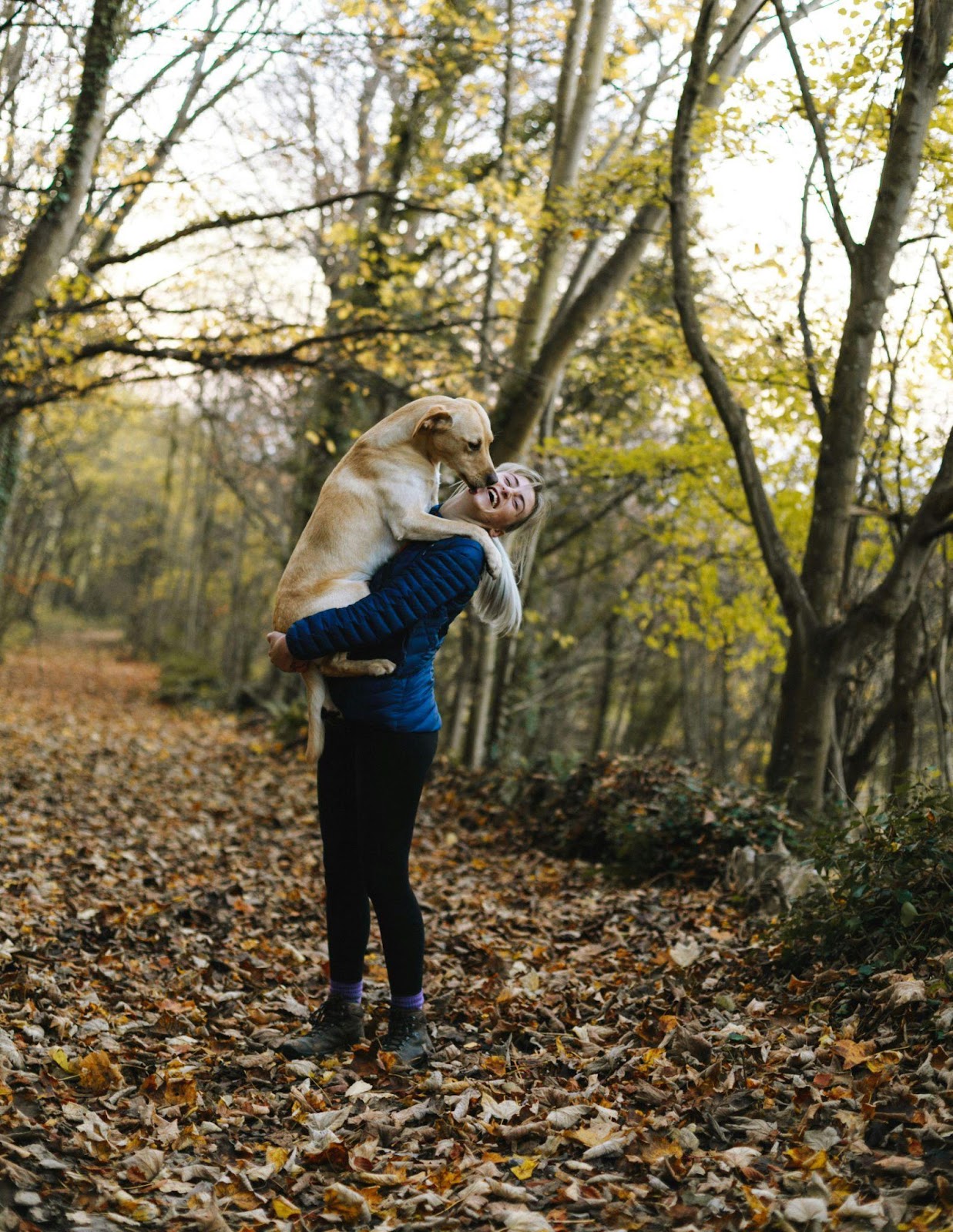 Woman hugging dog