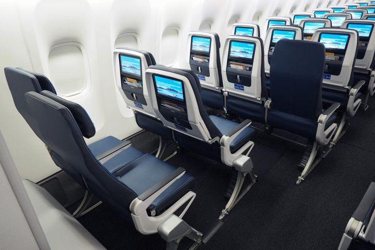 Rows of seats in an airplane

Description automatically generated