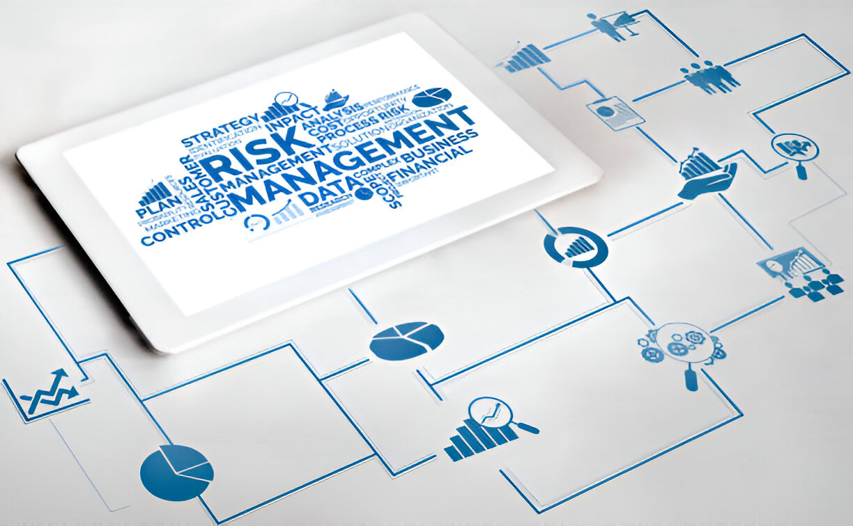 Tablet displaying a word cloud with 'Risk Management' at the center, surrounded by interconnected icons representing various aspects of financial risk management.