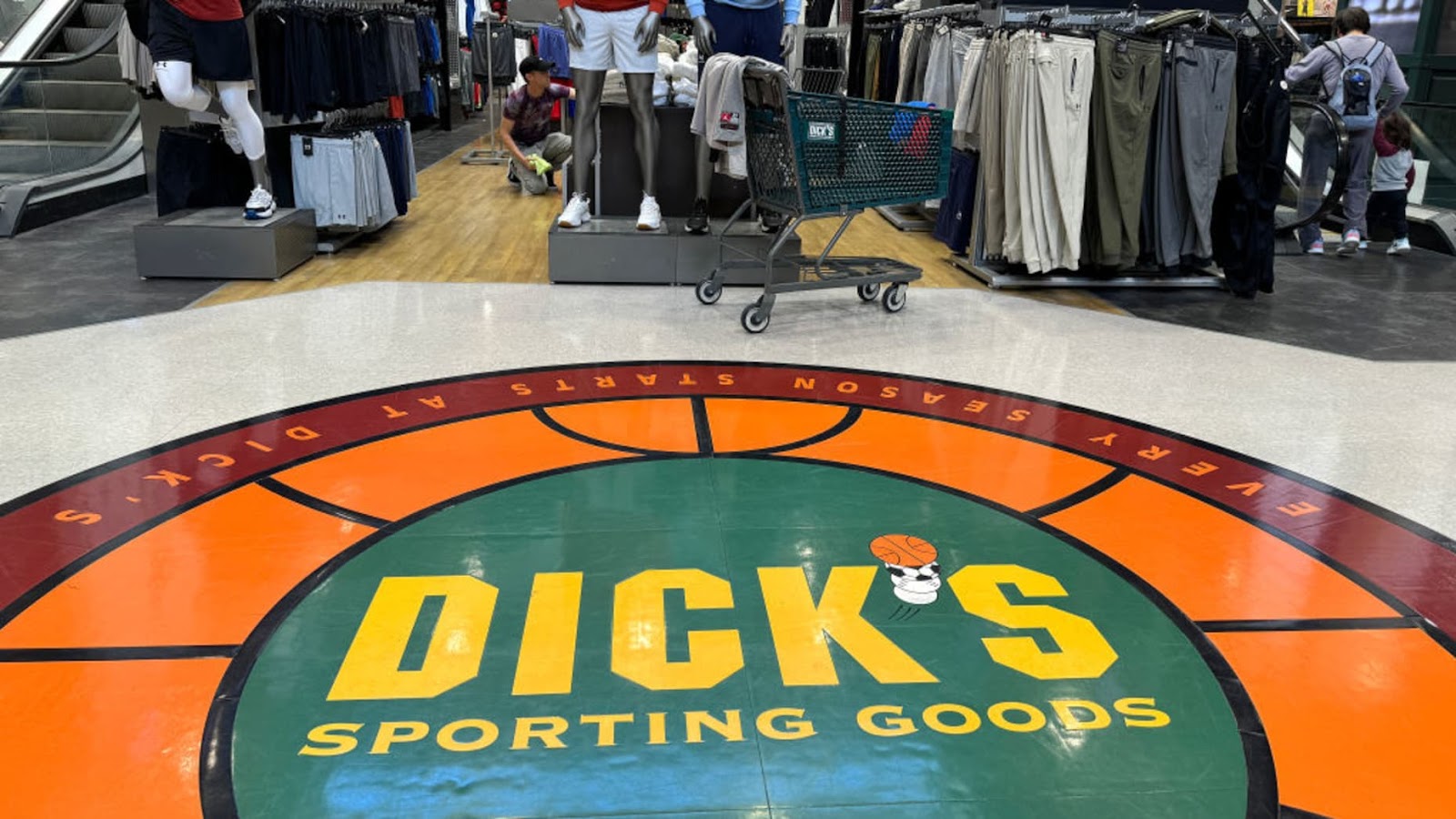 DALY CITY, CALIFORNIA - SEPTEMBER 04: The Dick's Sporting Goods logo is displayed on the floor of a store on September 04, 2024 in Daly City, California. Dick's Sporting Goods reported second-quarter earnings that beat analyst expectations with revenue of $3.47 billion compared to the forecast of $3.44 billion. (Photo by Justin Sullivan/Getty Images)