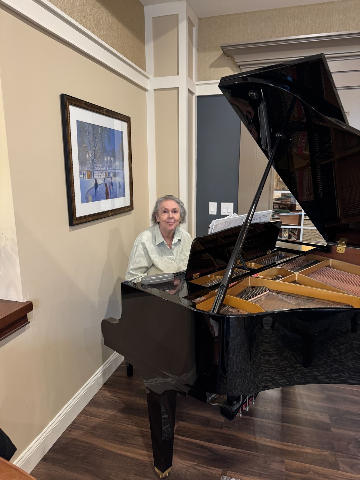 Woman sitting at the piano