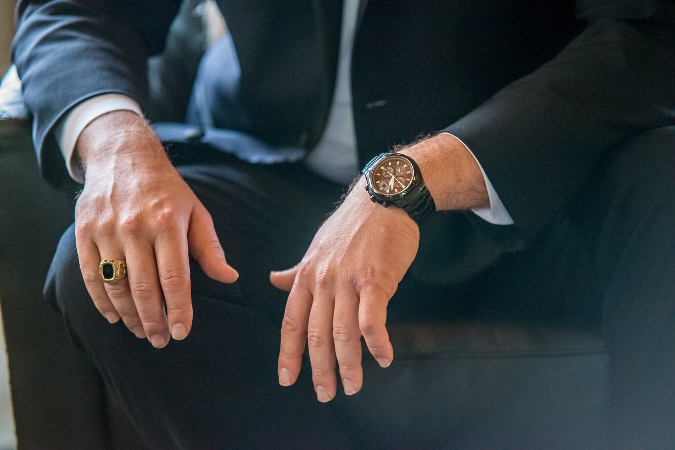 A sleek dress watch with a minimalist dial and leather strap, exemplifying classic formal watch style suitable for business meetings and black-tie events.