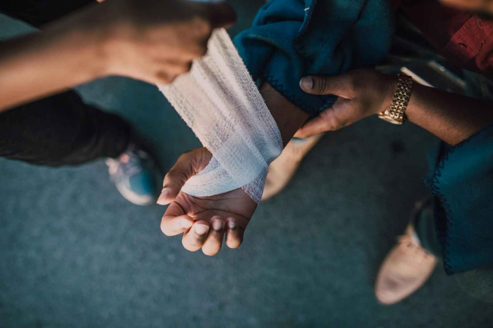 a person getting hand bandage