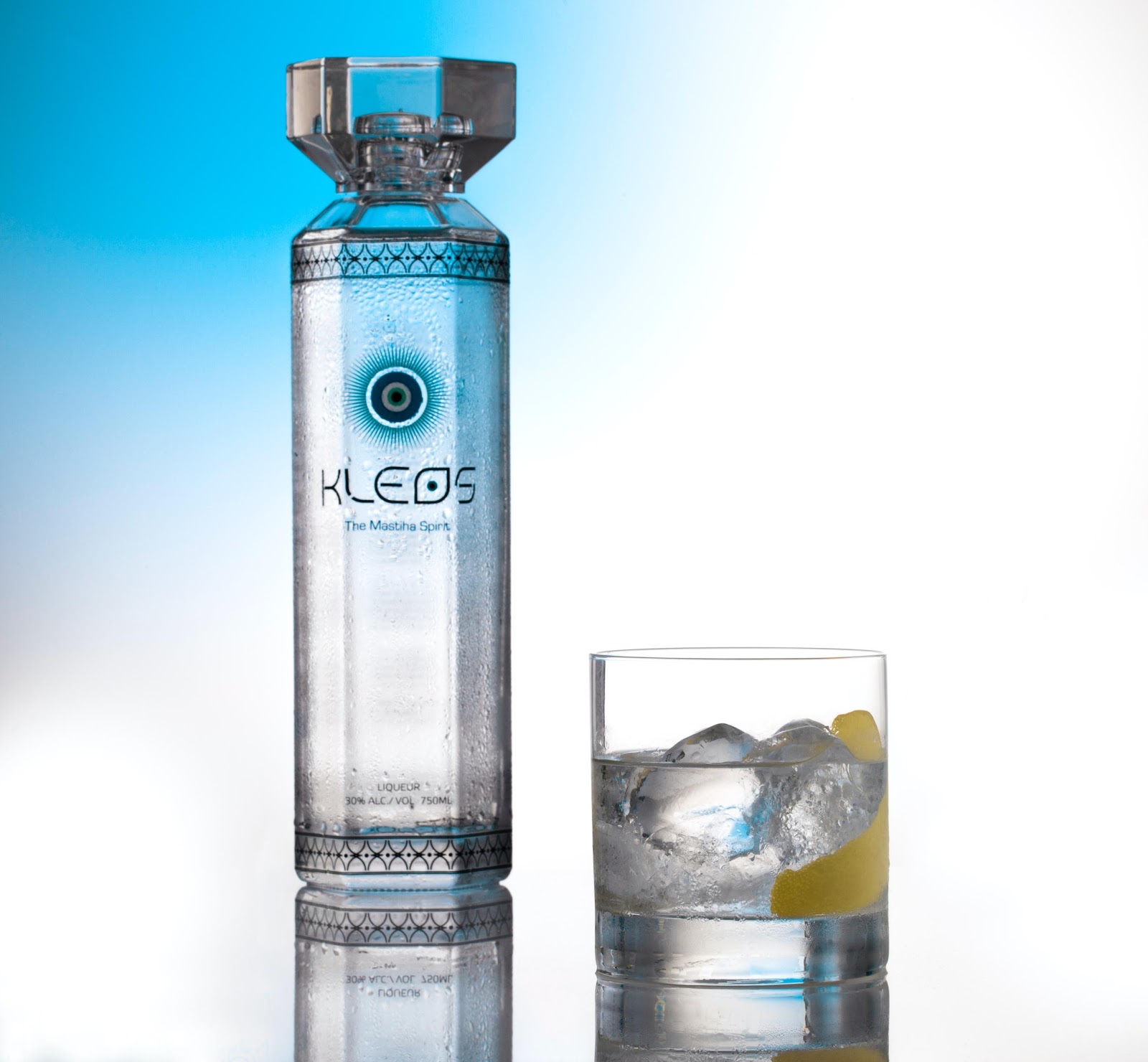 Bottle of KLEOS Mastiha Spirit with serving on the rocks with ice and lemon peel.

The Bartender's Olive Oil