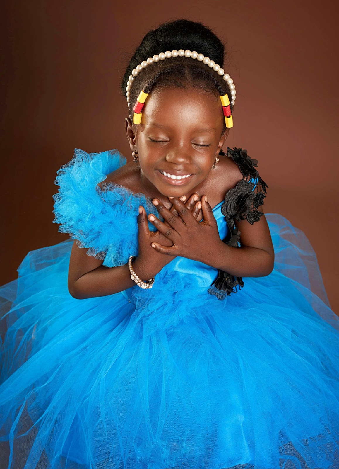 Beautiful girl in a gorgeous blue dress