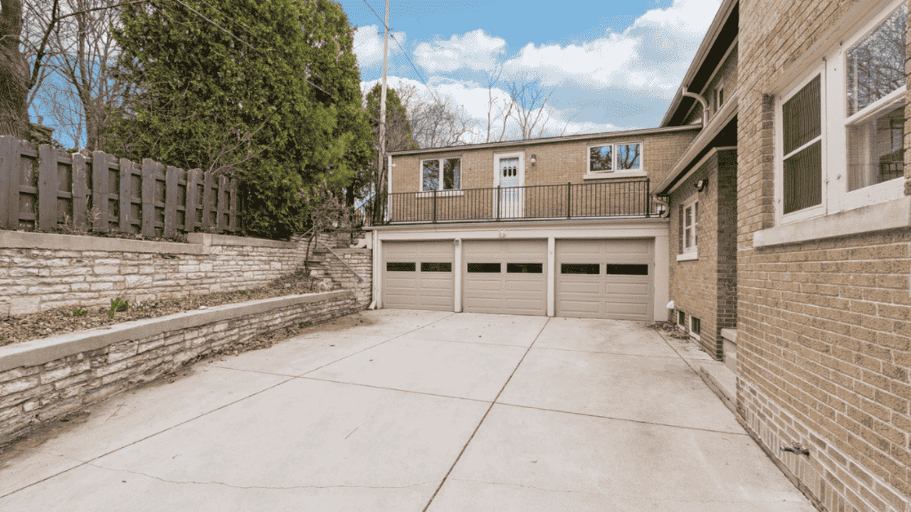 Tour This 3,766 Sq Ft Mediterranean Colonial in Wauwatosa, WI with Historic Charm and Courtyard Garden