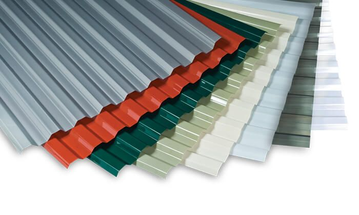 Photo of corrugated roof sheets in different colours. 