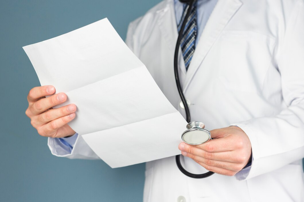 doctor holding medical report