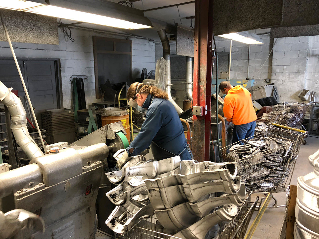 Aluminum castings being polished