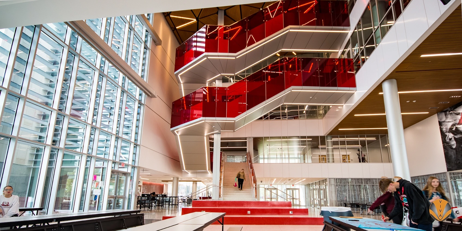 Customized red glass railing in a Texas high school. 