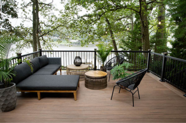 top deck designs for enjoying northern michigan lakeside decking area with sofa and coffee tables custom built boyne city