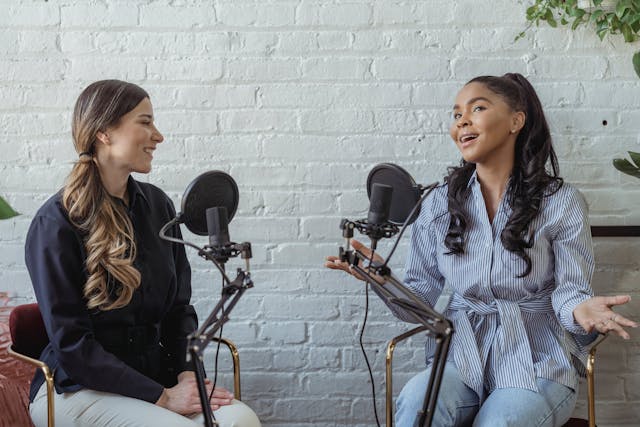 Two women doing a podcast episode