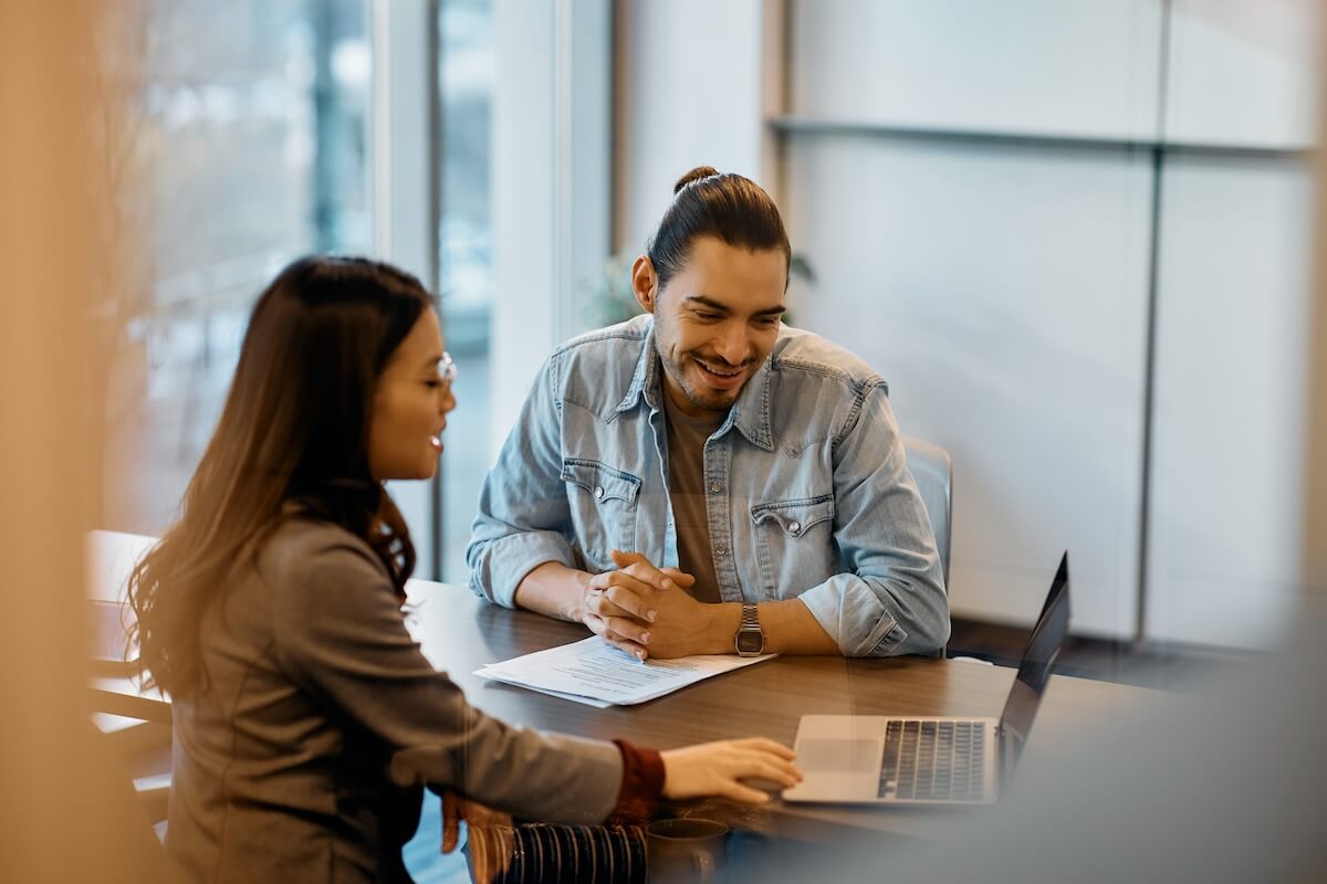 HR automation: colleagues using laptop