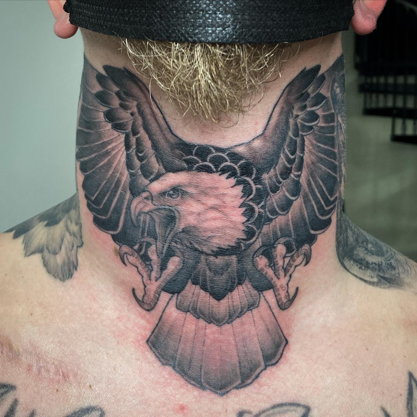 Eagle Throat Tattoo