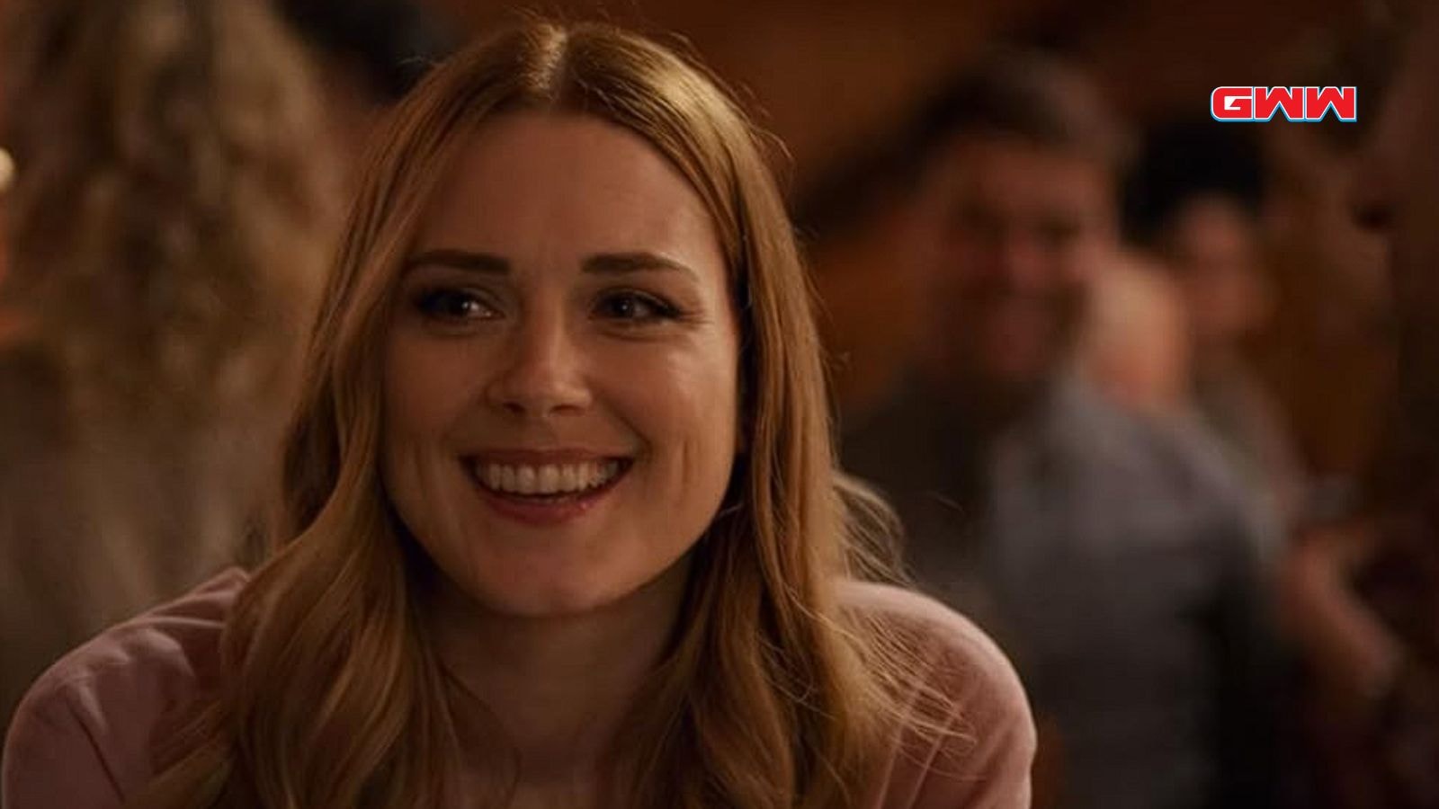 Alexandra Breckenridge smiling at a gathering Virgin River scene