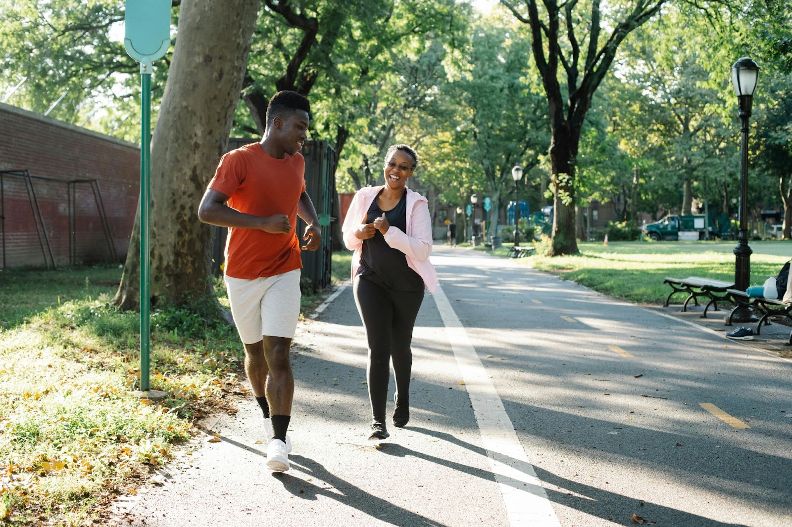 Couple Running on City Trail