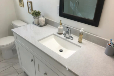 how to select the perfect countertops for your bathroom remodel onyx countertop with brushed nickel faucet and backsplash custom built michigan
