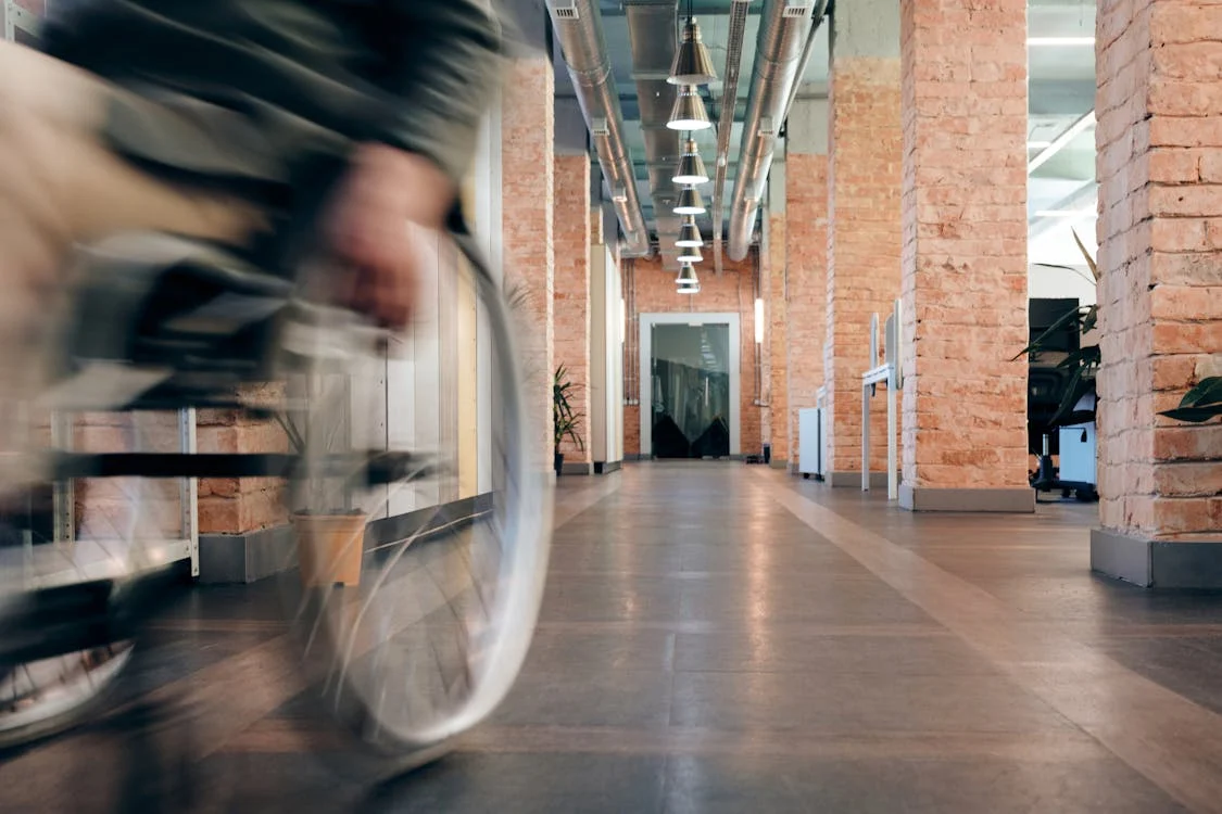 Hallway with person on wheelchair