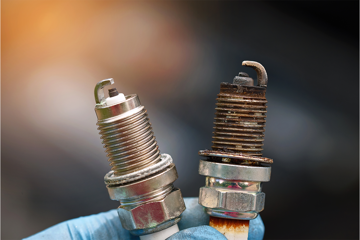 worn-out spark plugs causes inefficient burning of fuel leading to poor mileage