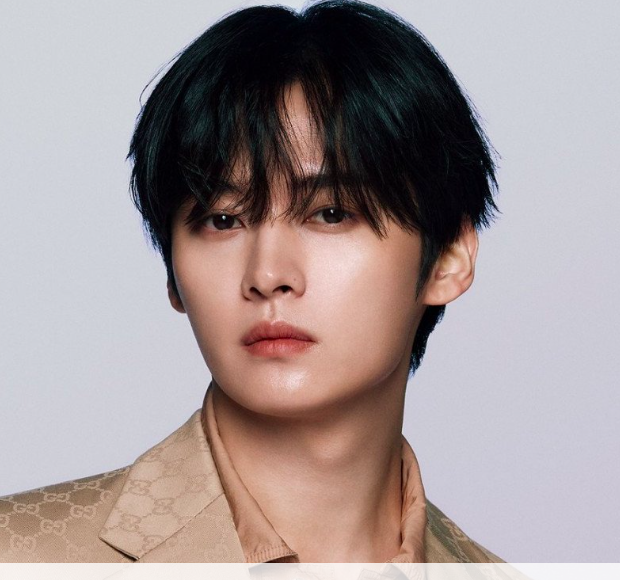 This contains an image of Lee Know Gucci Ambassador