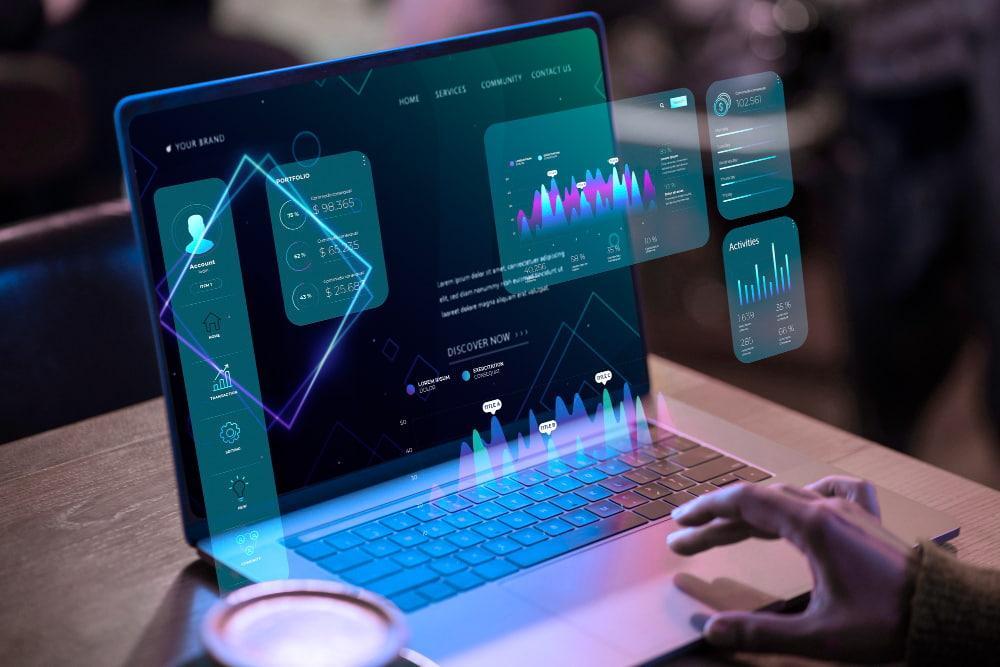 A laptop screen displaying graphs and digitally projected data, representing integration of AI tools for analysis.