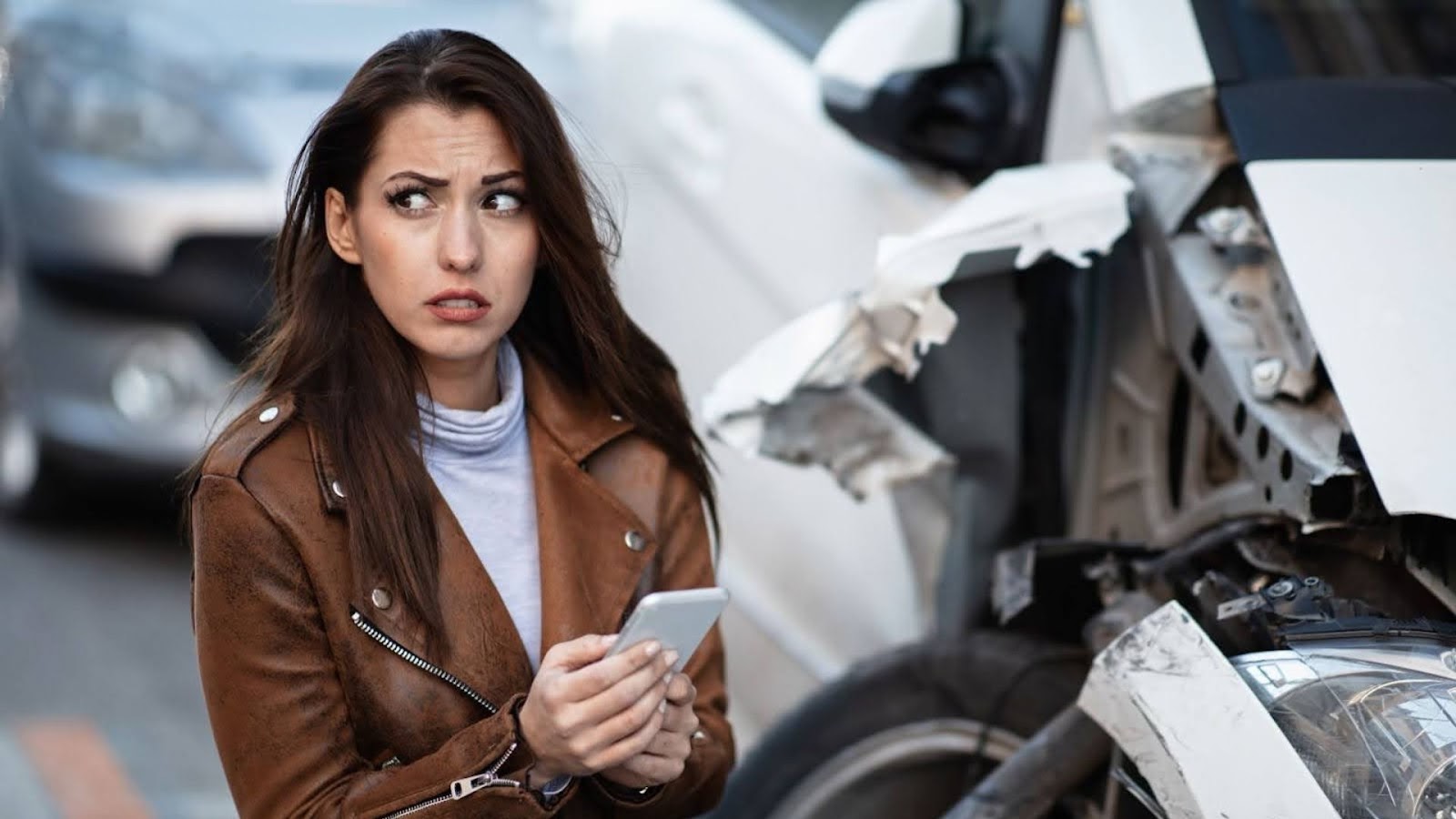 woman scared after a car accident