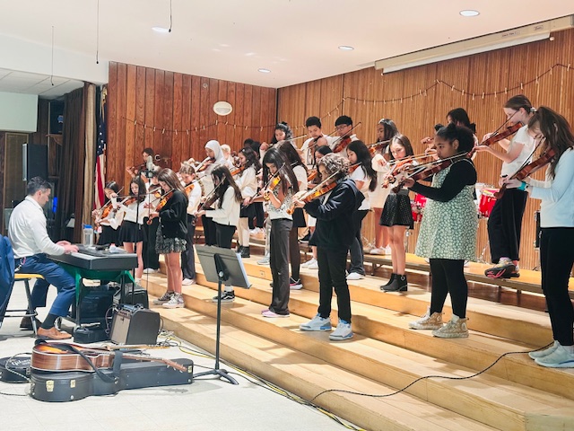 Davenport students performing for their community