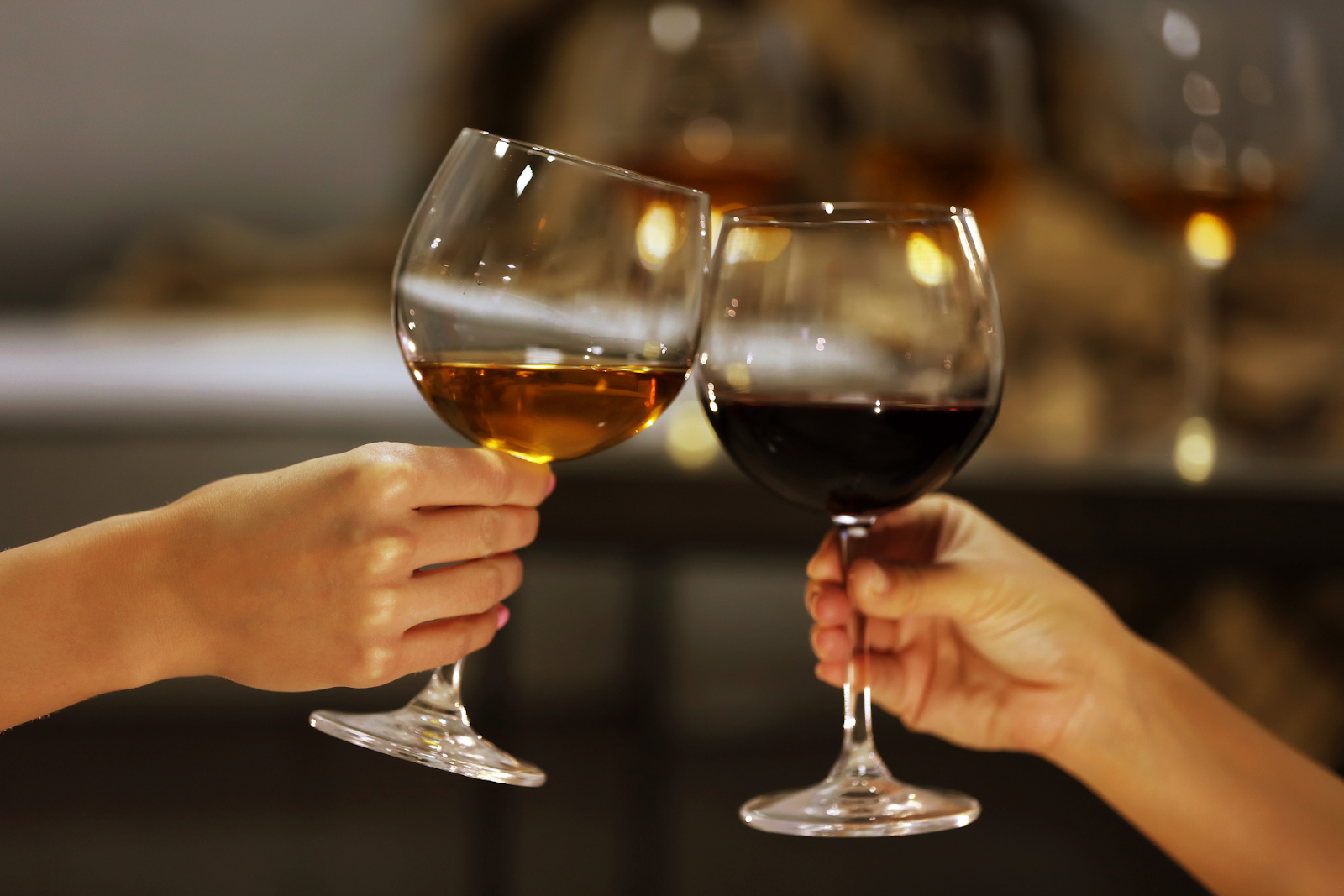 Cheers with white and red wine