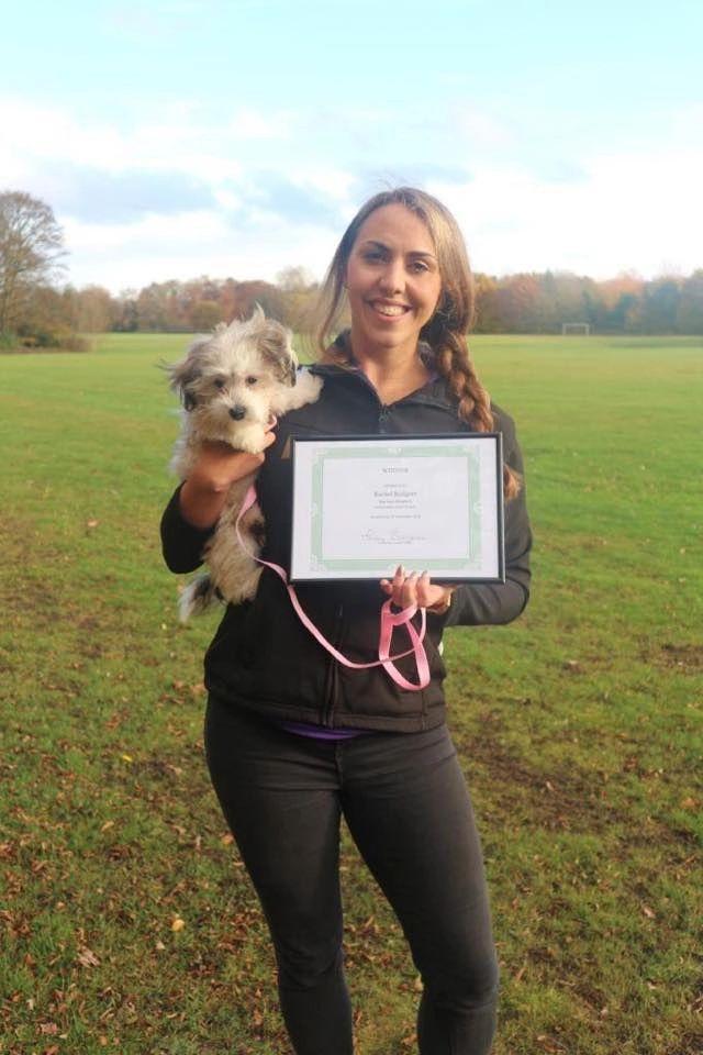 rachel rodgers with her dog trainer of the year award