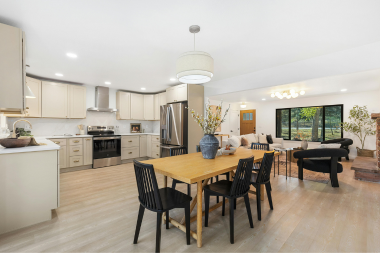 design tips for remodeling your northern michigan vacation rental open concept kitchen with pendant lighting custom built michigan