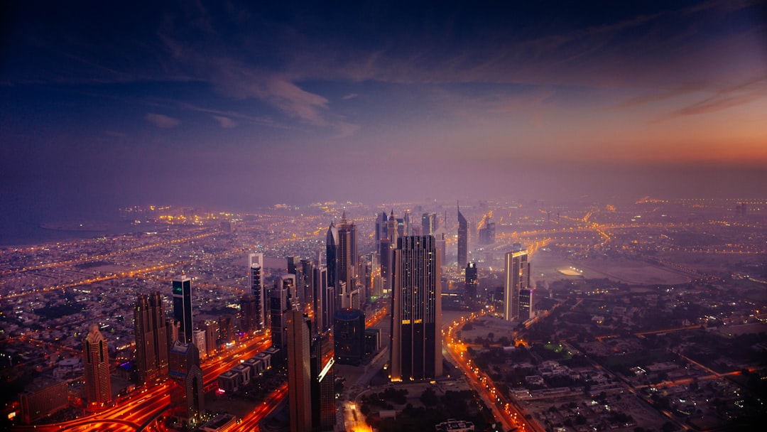 solar panels with a city skyline