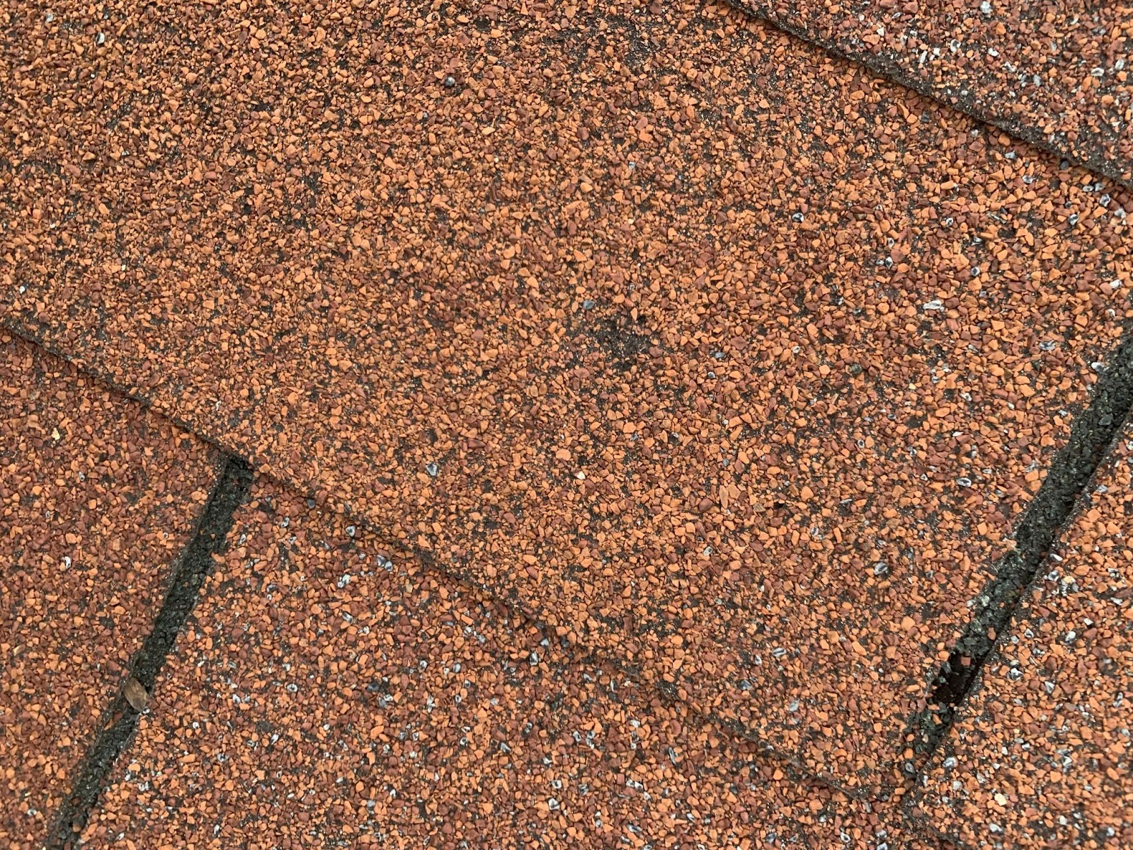 hail roof damage includes pock mark dents 