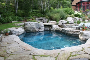 the complete guide to pool decks natural stone deck with pond and forestry custom built michigan