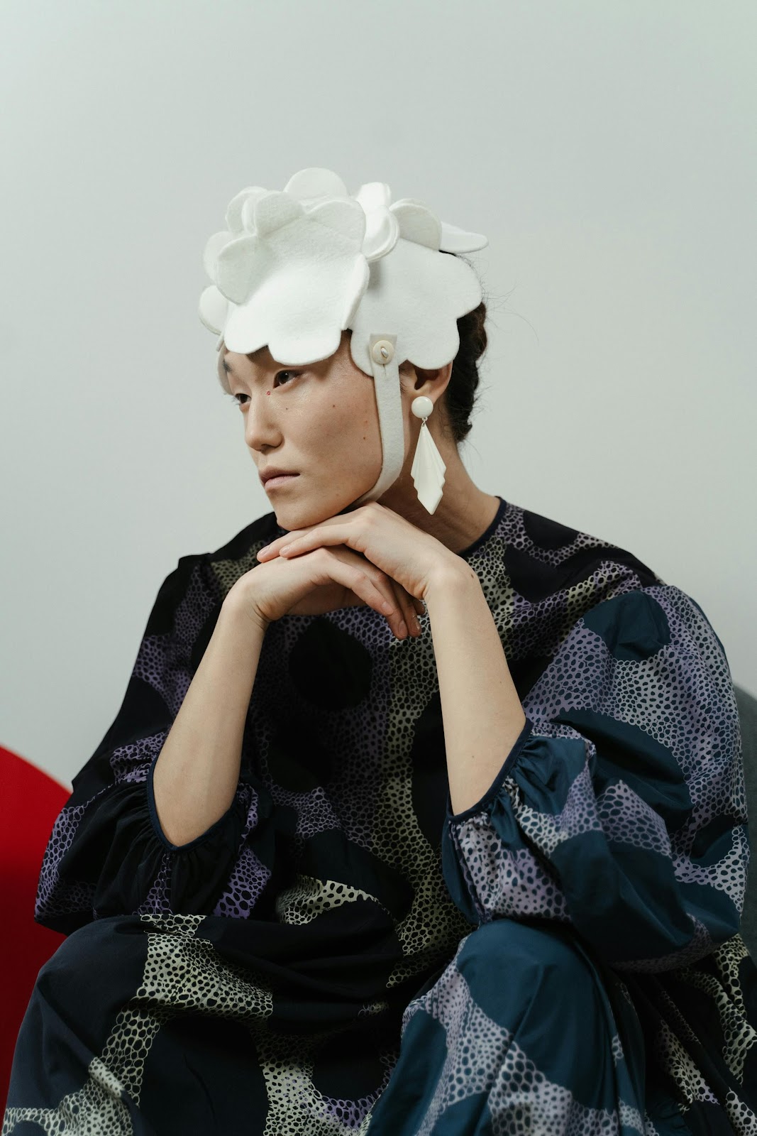 Image may contain Kim Bumsoo Face Head Person Photography Portrait Adult Fashion Clothing Hat and Dress