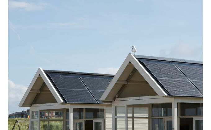 An energy efficient building may use solar panels or passive solar, where the building is positioned to optimize heat retention.