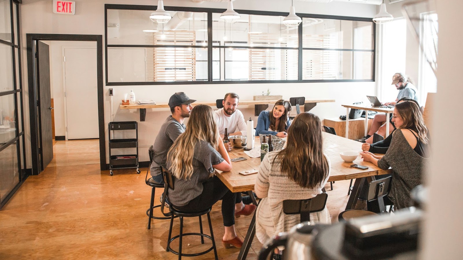 Group of colleagues sitting around a large table