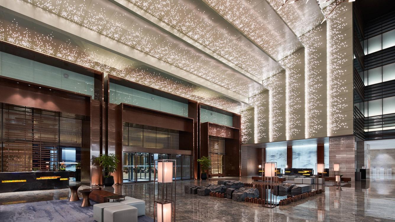 Spacious and elegantly designed Marriott hotel lobby offering world-class hospitality.