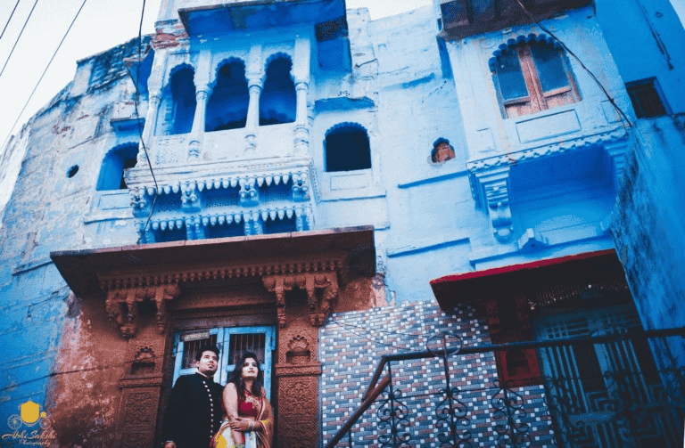 Pre-wedding shoot with couple walking through the golden sands of Osian Desert, Jodhpur